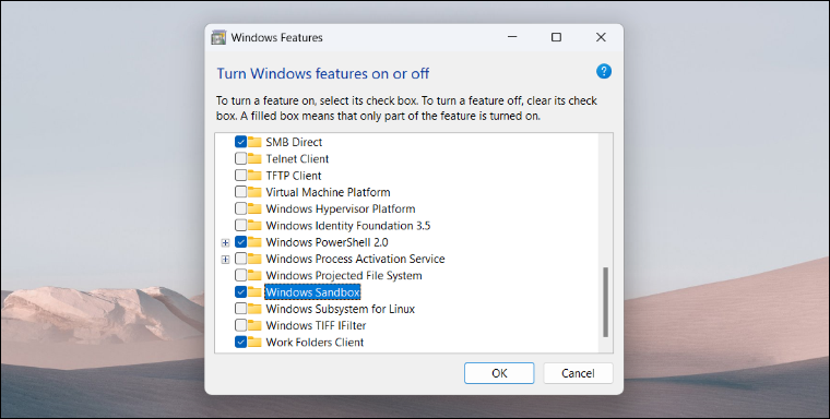 لتبدأ فى تفعيل خاصية Windows Sandbox ستقوم بفتح نافذة Windows Features من خلال فتح نافذة Run بالنقر على مفتاح Win + حرف R (قـ) معًا فى الكيبورد، ثم كتابة أمر "optionalfeatures" والنقر على زر Enter. من هُناك، قم بالتمرير إلى الأسفل حتى تعثر على خاصية Windows Sandbox مدرجة في القائمة، الآن ضع علامة صح (✔) بجوارها ثم أضغط على زر OK. انتظر حتى تحميل الملفات المطلوبة لتشغيل الخاصية وذلك عن طريق خدمة Windows Update ثم بعد الانتهاء اضغط على Restart لاعادة تشغيل الجهاز.